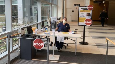 Screening station at entrance to Kellogg Eye Center